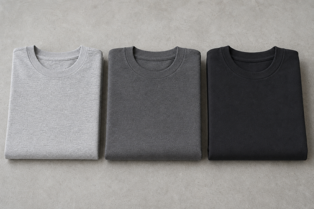Three folded T-shirts in different thicknesses illustrating light, medium, and heavyweight GSM options for streetwear
